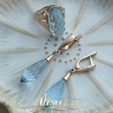 Комплект сережки и кольцо золото с натуральным голубым топазом огранки бриолет и овал