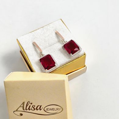 Серьги из серебра с золотыми вставками рубинами и цирконами