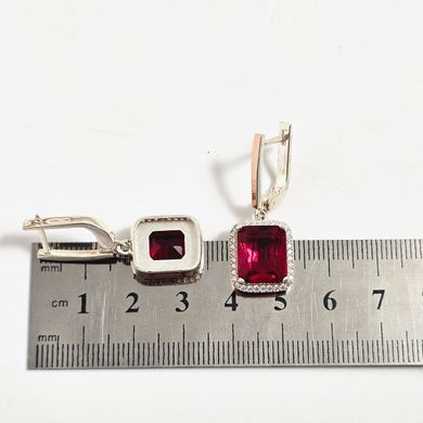 Серьги из серебра с золотыми вставками рубинами и цирконами
