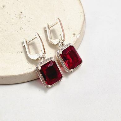 Серьги из серебра с золотыми вставками рубинами и цирконами