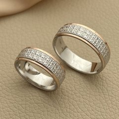 Обручальные кольца из серебра с золотыми вставками и объемным орнаментом пара
