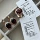 Комплект золотий каблучка та сережки з червоними овальними гранатами та круглими білими фіанітами