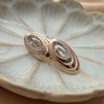 Серьги золотые овальной формы с белыми круглыми фианитами